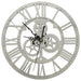 Decorative wall clock with mechanical design on a white background