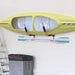 Wall-mounted heavy duty kayak rack with yellow kayak and paddle in a garage