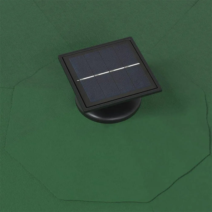 Black solar panel on green parasol canopy, wall-mounted parasol accessory detail
