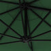 Underneath view of green canopy wall-mounted parasol frame and black metal spokes