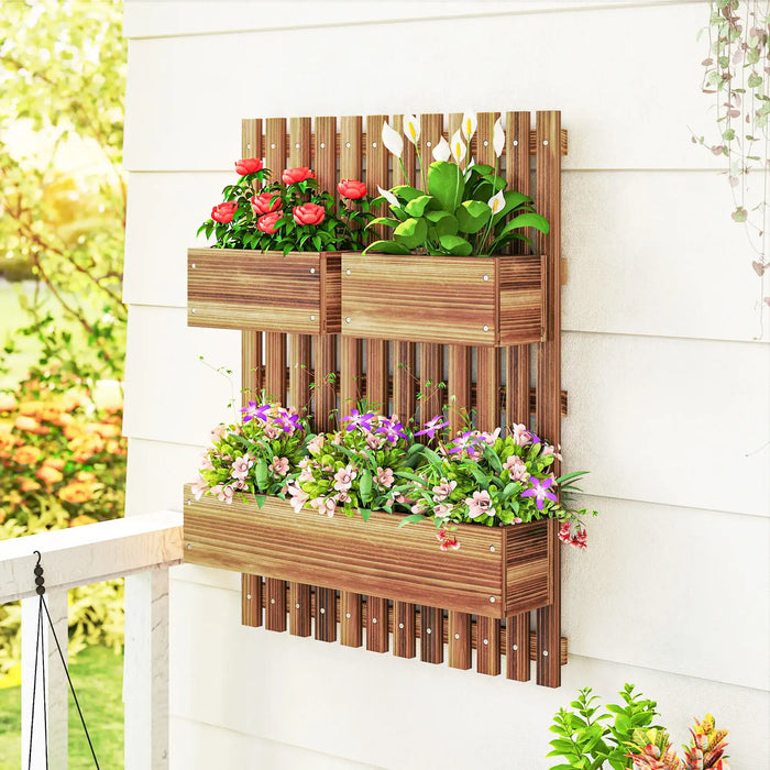 Wall-mounted wooden planter with trellis featuring three planter boxes filled with colorful flowers on white outdoor wall