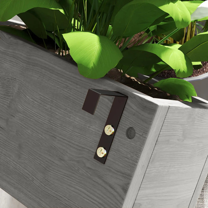 Close-up of grey wall-mounted wooden planter with trellis, filled with green leafy plants