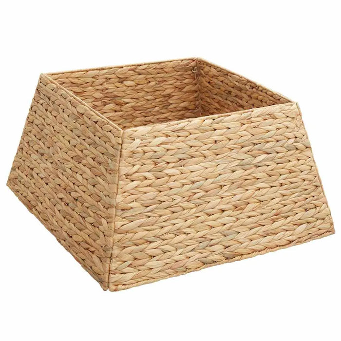 woven natural fiber trapezoid basket with wide top and narrow base on white background
