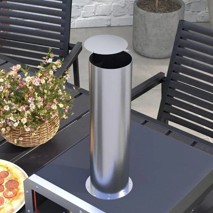 Wood-fired rotating pizza oven with metal chimney, cordierite stone, outdoor patio setting