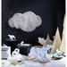 Wooden baby rocking polar bear in snowy arctic-themed nursery with toys and decor