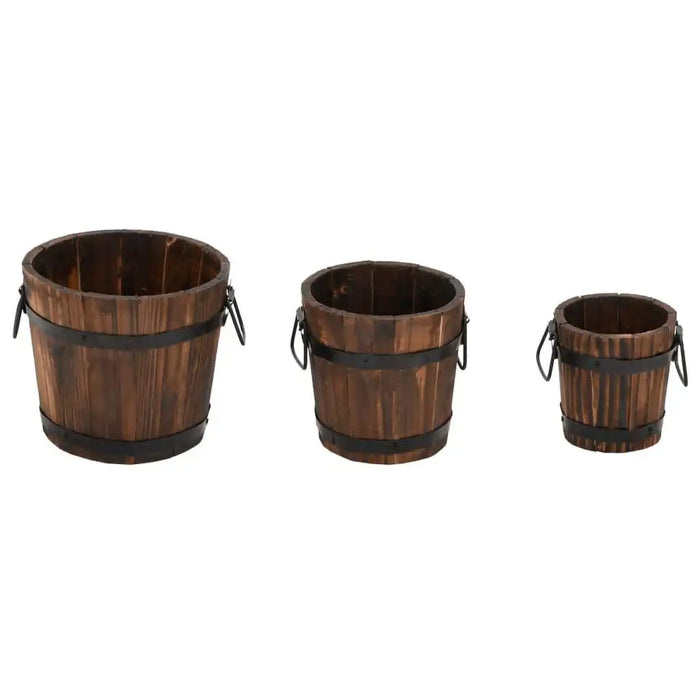 Set of three solid fir wood bucket planters with burned look and metal handles on white background
