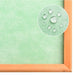 Green water-resistant roof panel with wooden frame and close-up of water droplets