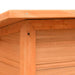 Close-up of outdoor pine and fir wooden dog house with water-resistant roof