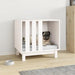 White wooden dog house with minimalist design and small dog inside, on light wood floor