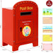 Red toy post box with a cartoon elephant character and included postcards on a white background.