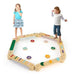 Two children playing on a wooden Montessori balance beam set with stepping stones.