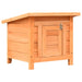 Brown wooden outdoor cat house with slanted roof and latch door