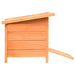 Brown wooden outdoor cat house with slanted roof and ramp, weather-resistant shelter