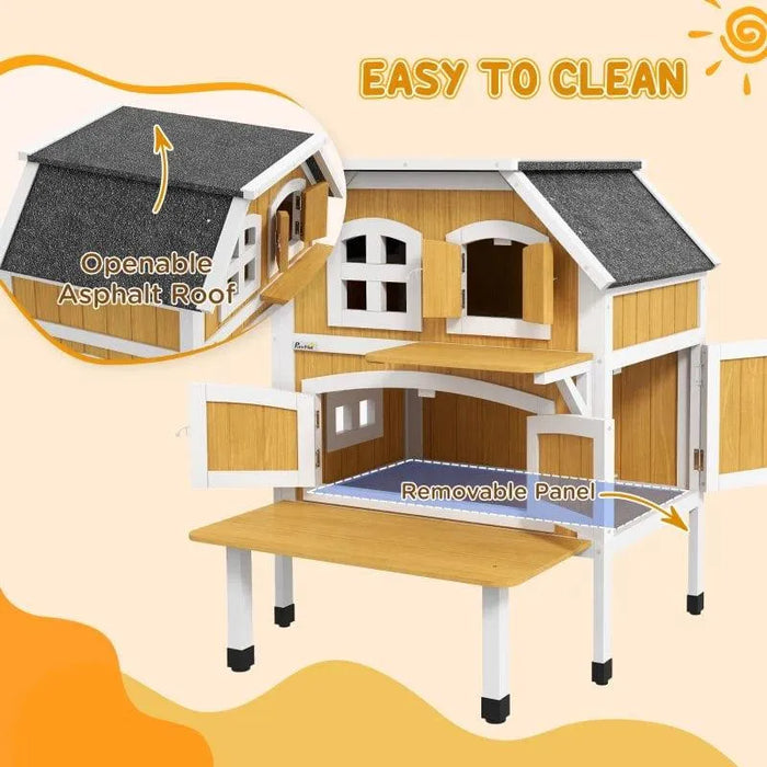 Two-tier wooden outdoor cat house with yellow panels, openable asphalt roof, and removable panel.