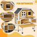 Yellow wooden outdoor cat house with two tiers, terrace, upper and side doors, PawHut design.