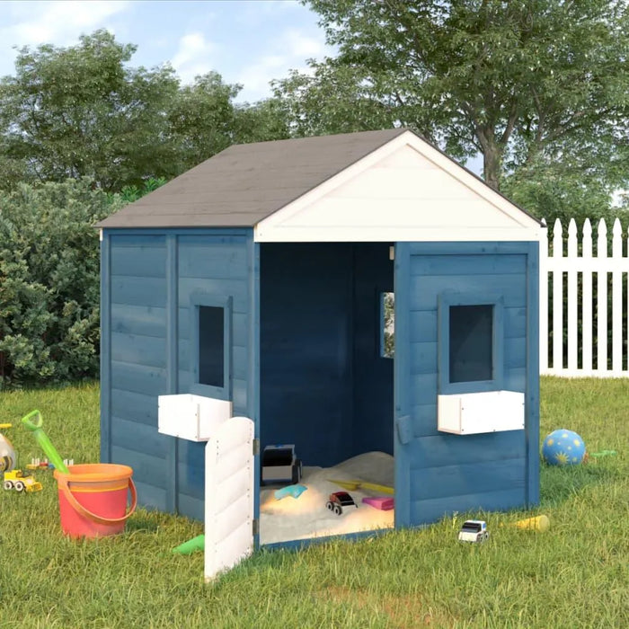 Blue and grey wooden outdoor playhouse in grassy yard with toys and white fence