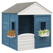 Blue and grey wooden outdoor playhouse with white trim and flower boxes on windows
