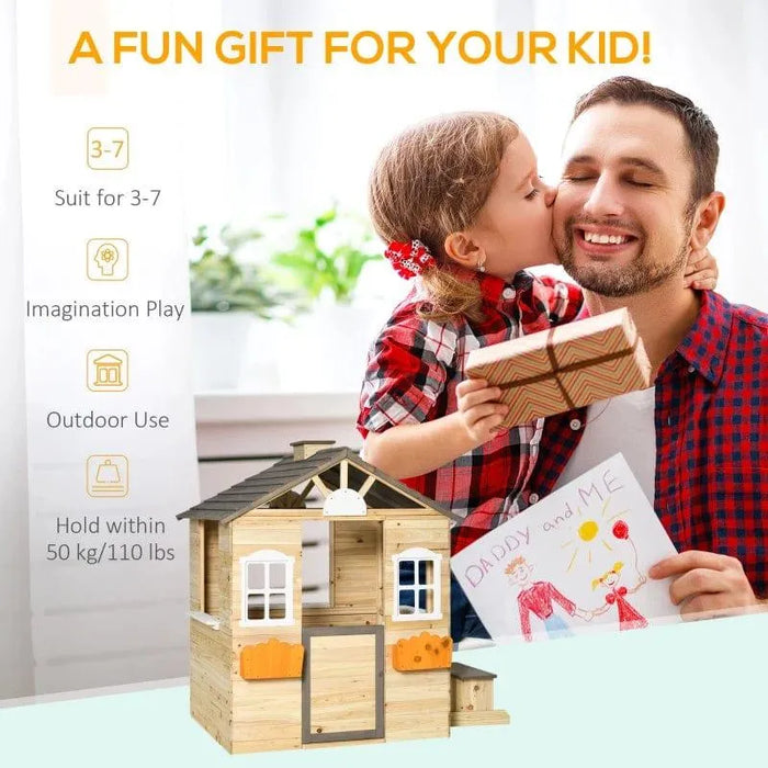 Child kissing smiling man while holding gift, with wooden outdoor playhouse and card nearby