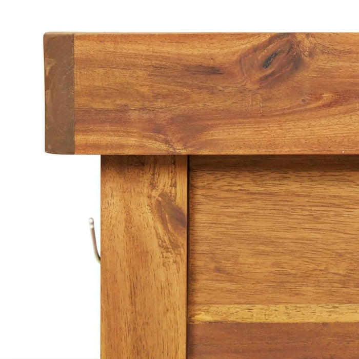 Close-up of solid acacia wood potting bench corner with natural grain detail
