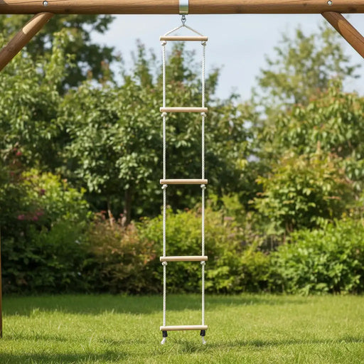 Wooden rope ladder with five rungs hanging outdoors on playground frame, green grass below