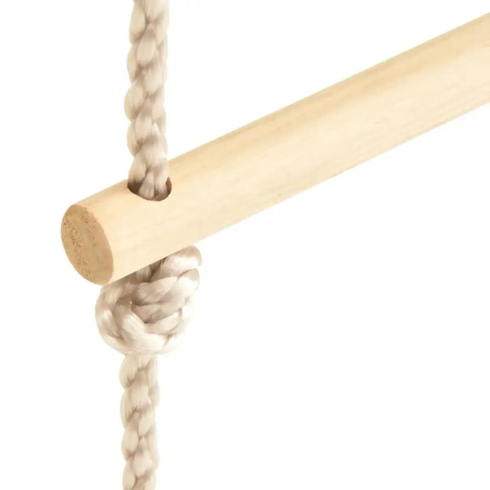 Close-up of a solid wood and PE rope ladder rung climbing accessory