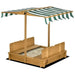 Wooden sandbox with benches and green striped adjustable canopy