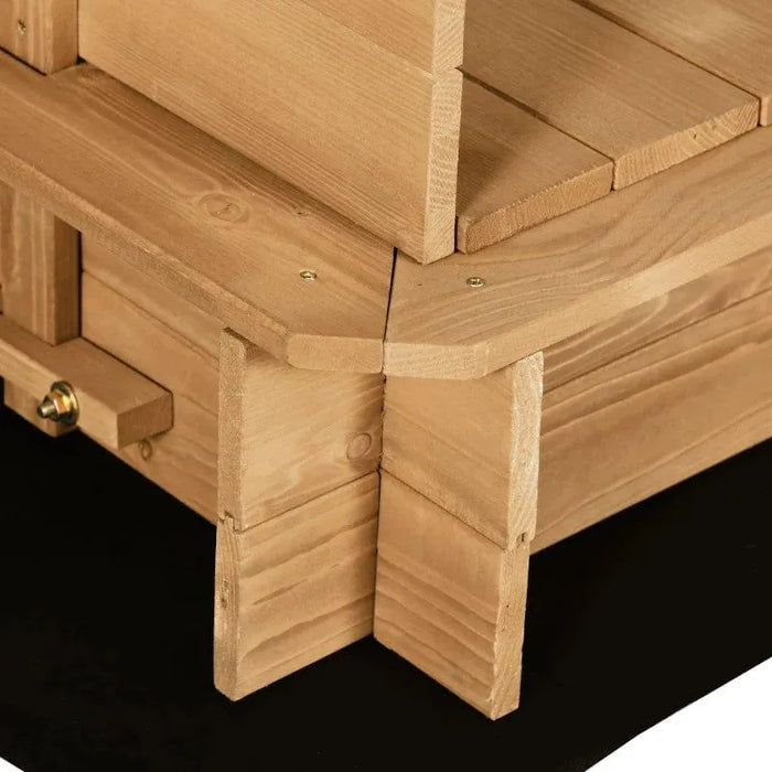 Close-up of wooden sandbox corner with convertible bench and visible metal hardware