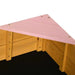 Wooden sandbox corner with pink triangular seat and natural wood panels
