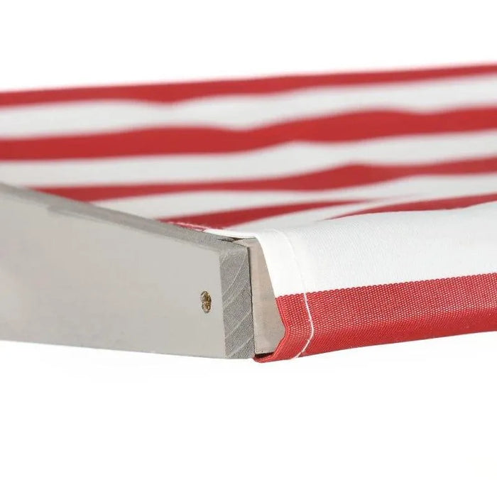 Close-up of wooden sandbox frame with red and white adjustable canopy fabric.