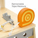 Wooden retractable tape measure on kids carpentry workbench playset