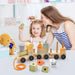 Mother and child playing with wooden train set educational pull along toy for toddlers