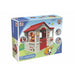 Grand Cottage playhouse toy set box with colorful red roof and children playing illustrated