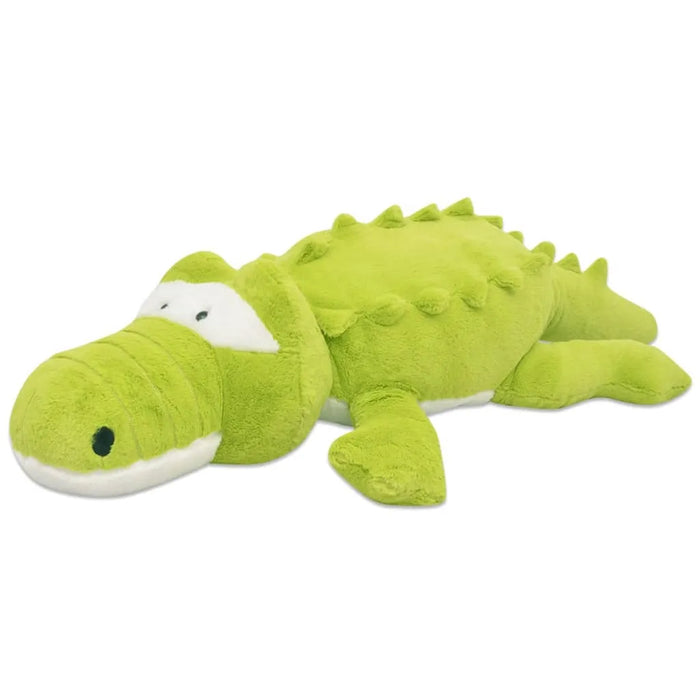 Green plush alligator toy on a white background