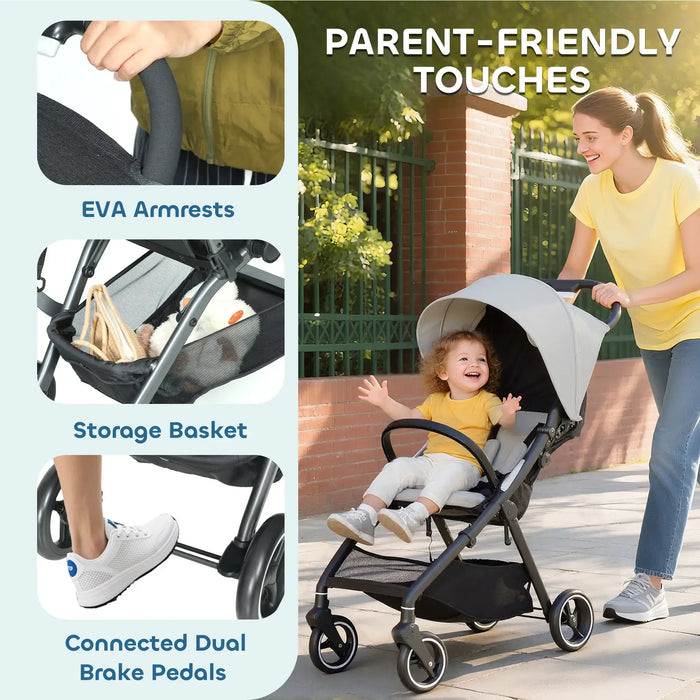 Stroller with features highlighted and a woman pushing a child in it.