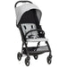 White and black stroller on a white background