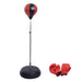 Red and black freestanding punching ball with adjustable pole and black base, red boxing gloves