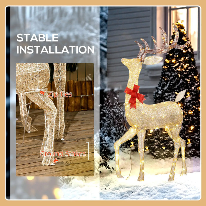 Lighted outdoor Christmas deer decoration with red bow, snow and lit trees, stable installation with zip ties and ground stakes