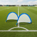 2-pack mini blue and black football goals on grass field, steel and fiberglass frame