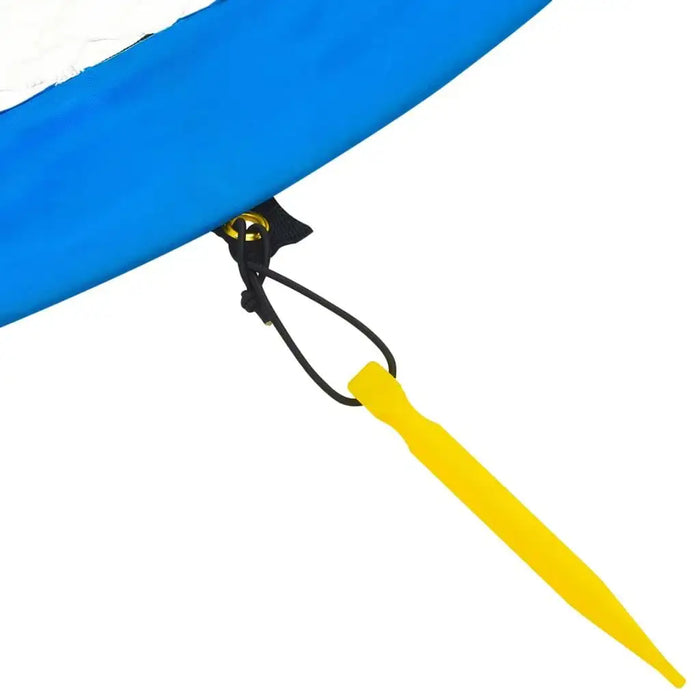 Close-up of yellow ground stake securing blue football goal post with black cord