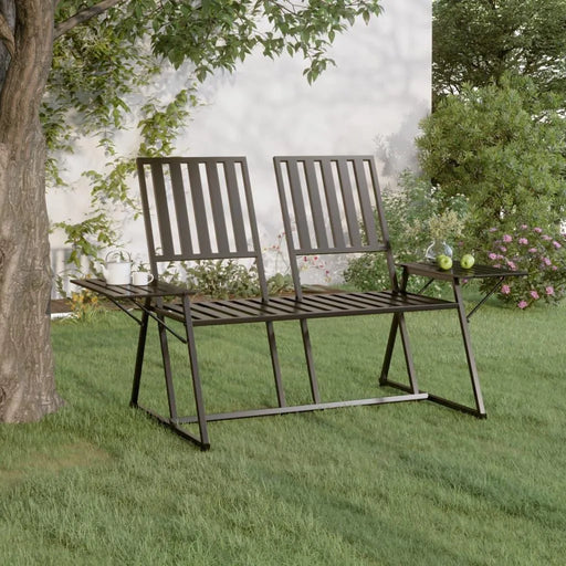 Black metal 2-seater garden bench with side tables on green lawn under tree