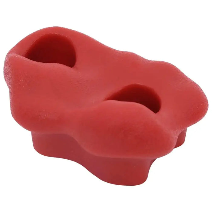 Red kids climbing hold with textured surface and two grip holes