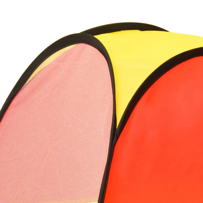 Close-up of colorful 3-in-1 kids play tent with yellow, red, and pink panels