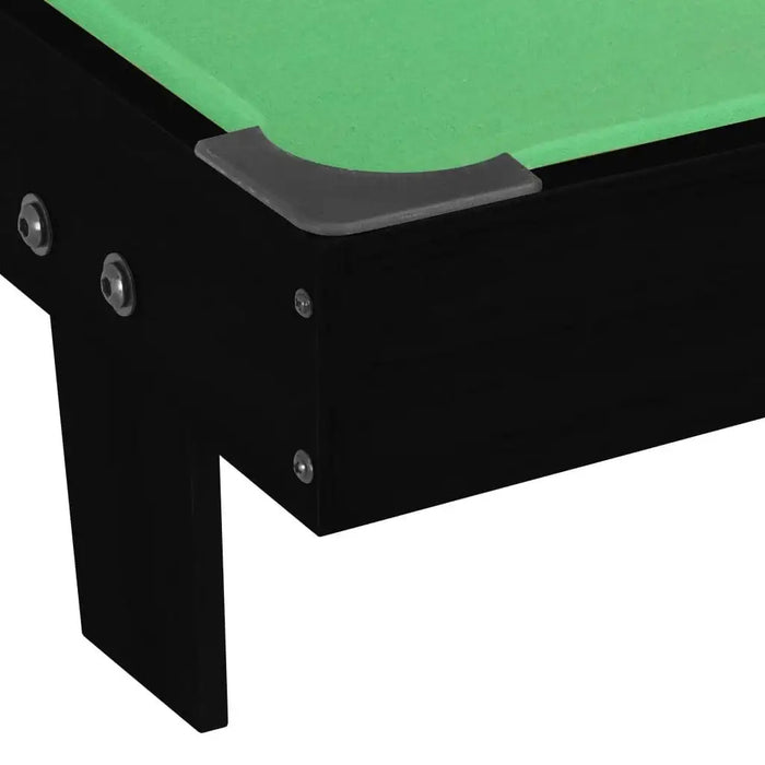 Corner view of a black 3ft portable tabletop pool table with green felt surface.