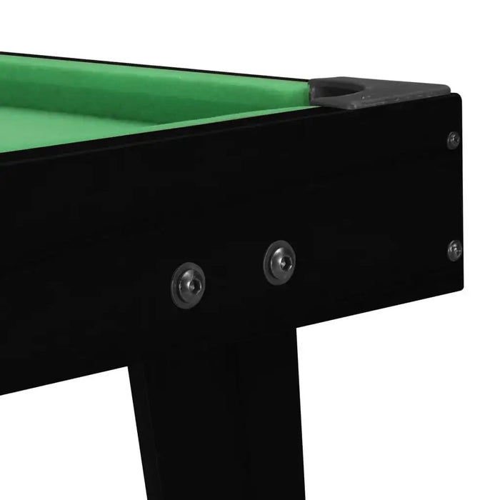 Close-up of black 3ft portable tabletop pool table with green felt surface
