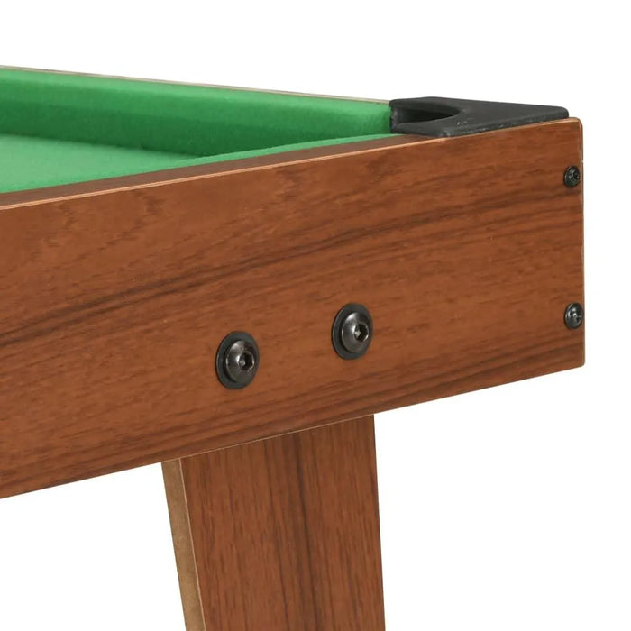 Brown tabletop pool table with green felt and wood finish detail