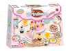 54-piece wooden birthday cake playset with pink cake, toy tea set, cupcakes, and cookies