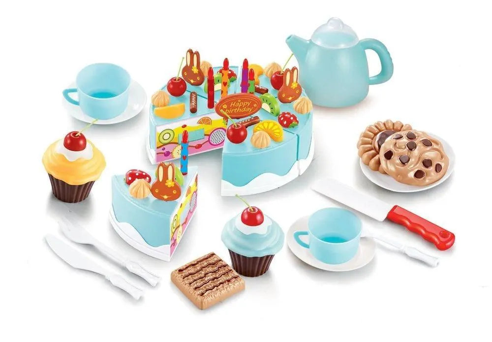 Wooden birthday cake playset with tea service, cupcakes, cookies, and accessories on white background