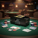 Automatic card shuffler on poker table with playing cards and chips, casino setting