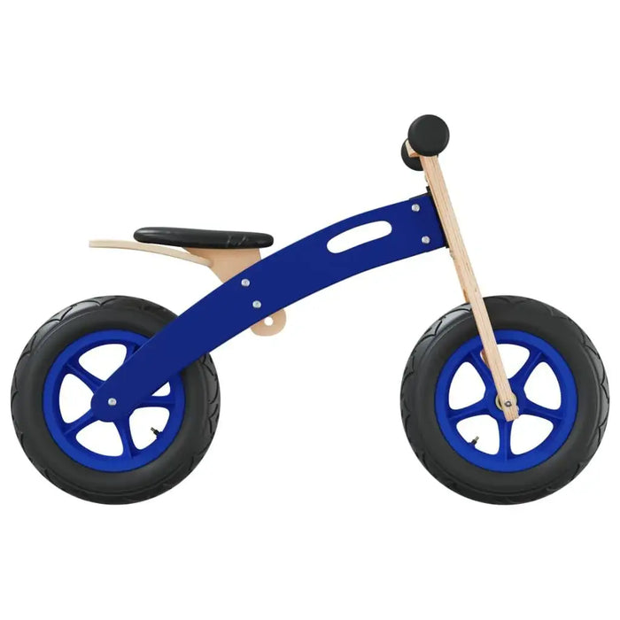 Blue and black balance bike with plywood frame, adjustable seat and handlebar on white background