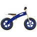 Blue and black balance bike with plywood frame, adjustable seat and handlebar on white background